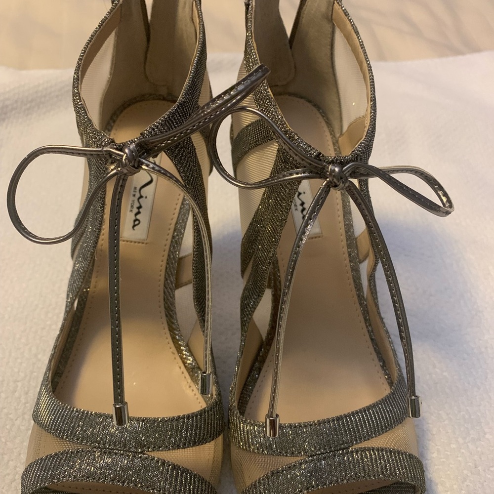 Nina of New York 4 inch stiletto heels, goals, silver with silver tassels
